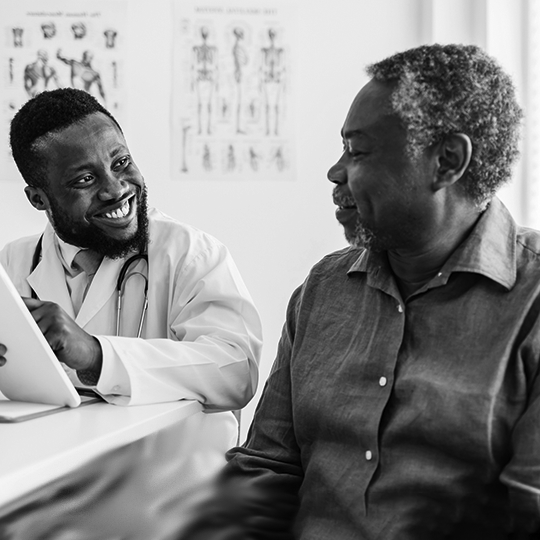 picture of patient and doctor talking