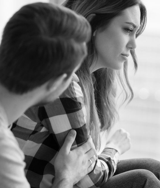 A person consoles her friend