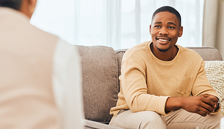 A man talks with a therapist