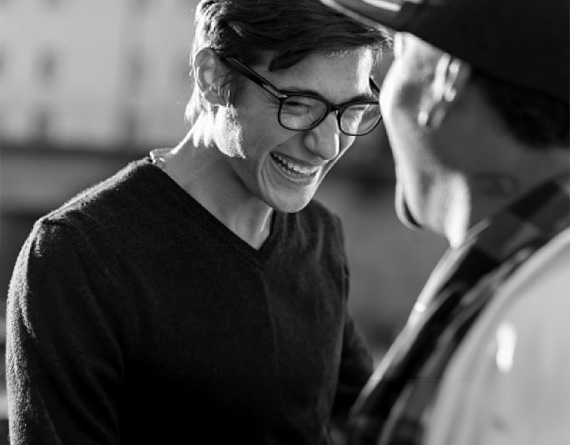 Two men laughing together