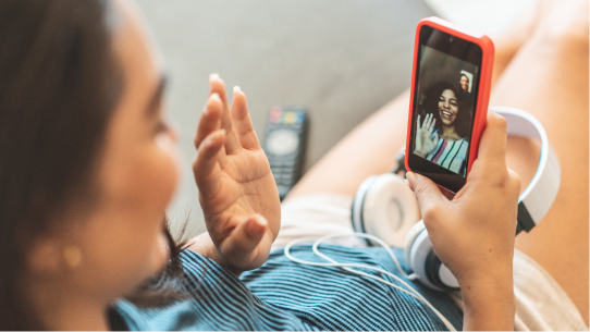  Two women talk on a video chat