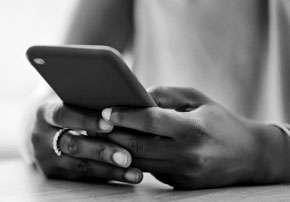Hands holding smart phone