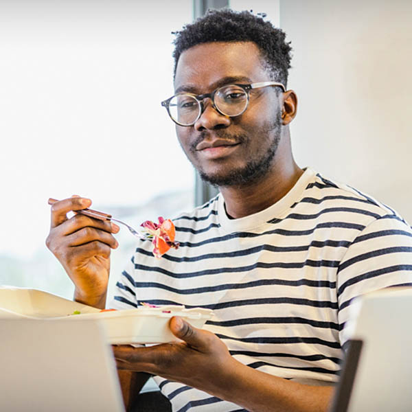 person looking at laptop