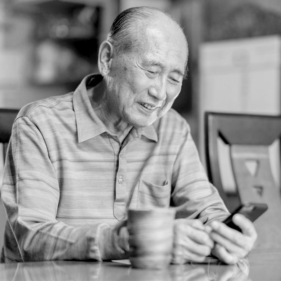 Member looking at his phone