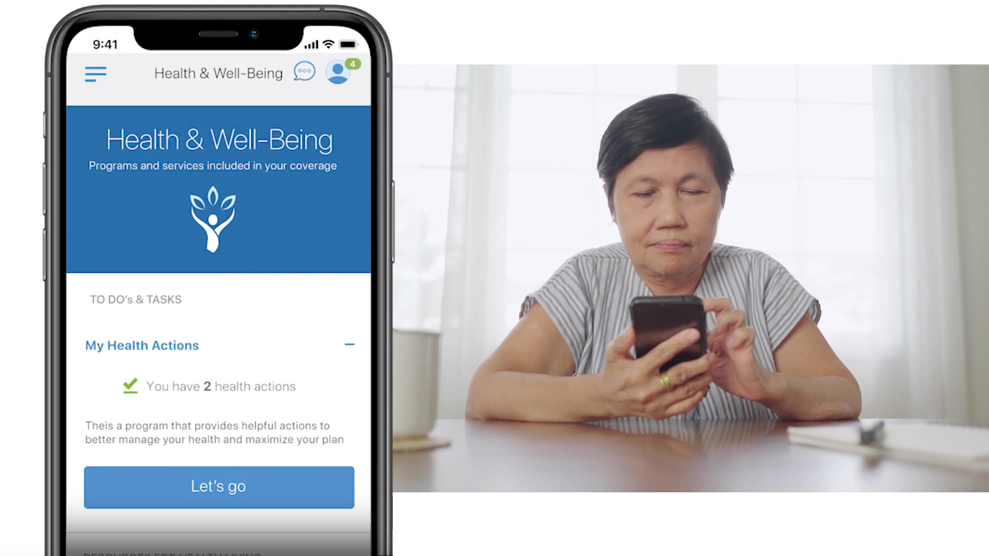 A person looking at a mobile device displaying health and well-being information
