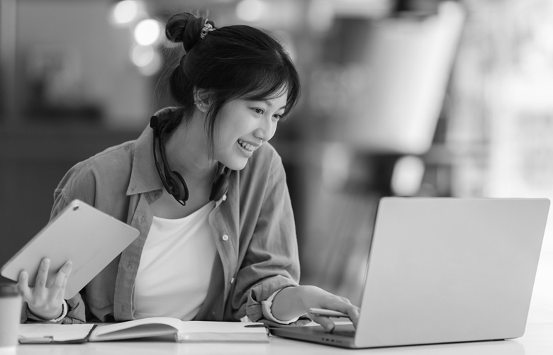 A woman working on her laptop