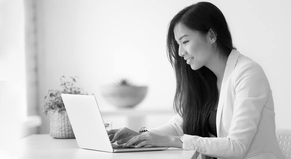 A woman looks for services online. 
