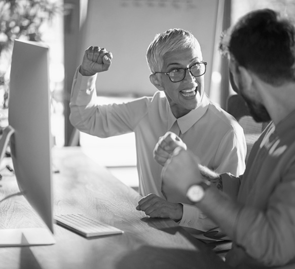 Two people get excited about their benefits. 