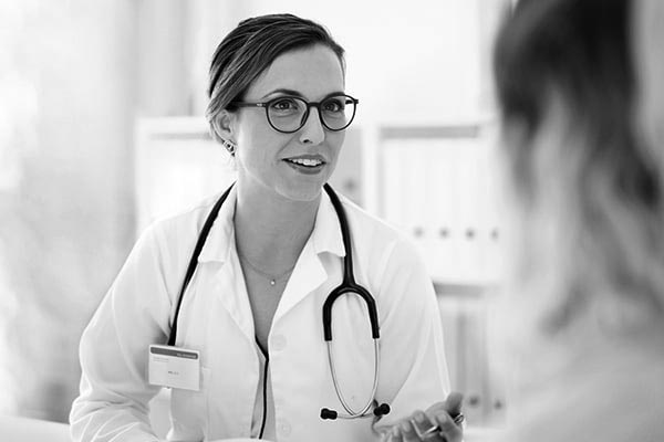 A patient talks with a health care provider