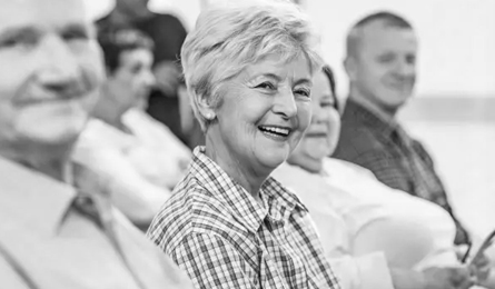 Older adults sitting together, smiling