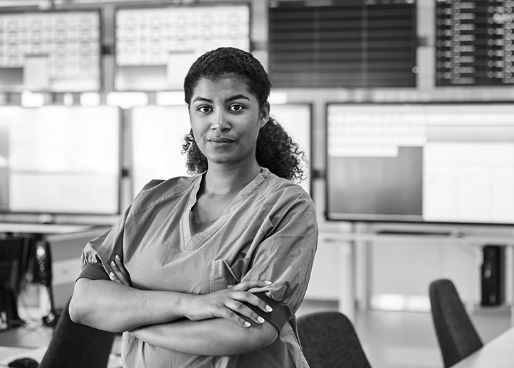 Blue Cross Blue Shield of Michigan health professional crossing her arms.