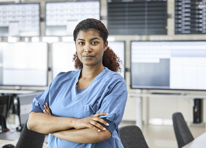 Blue Cross Blue Shield of Michigan health professional crossing her arms.