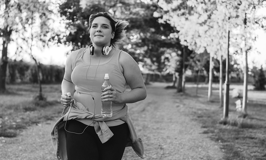A woman jogging outdoors
