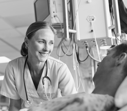 A medical professional assists a patient