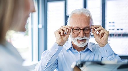 A man check out his new glasses