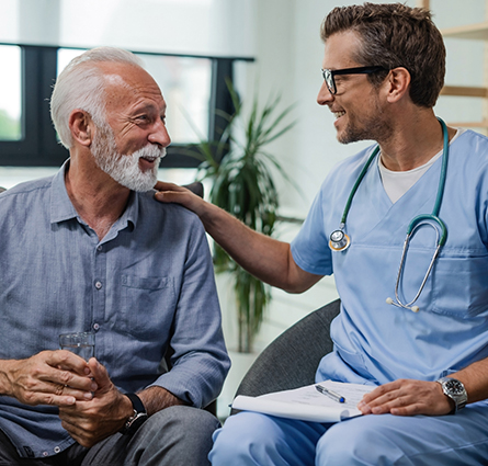 A man with a Medicare Advantage plan talks with a medical professional about his health.
