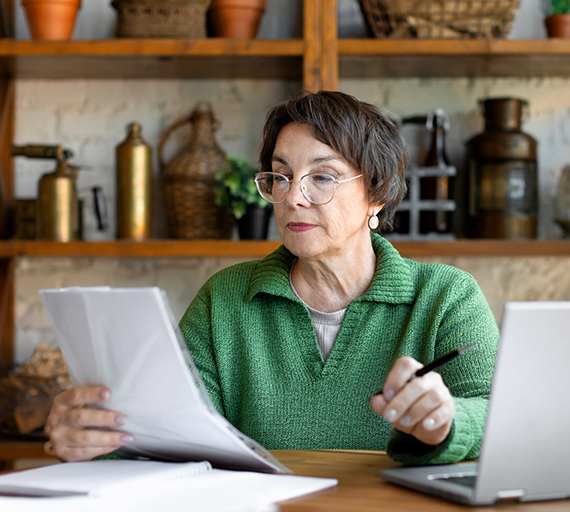 A woman looking at Medicare resources.