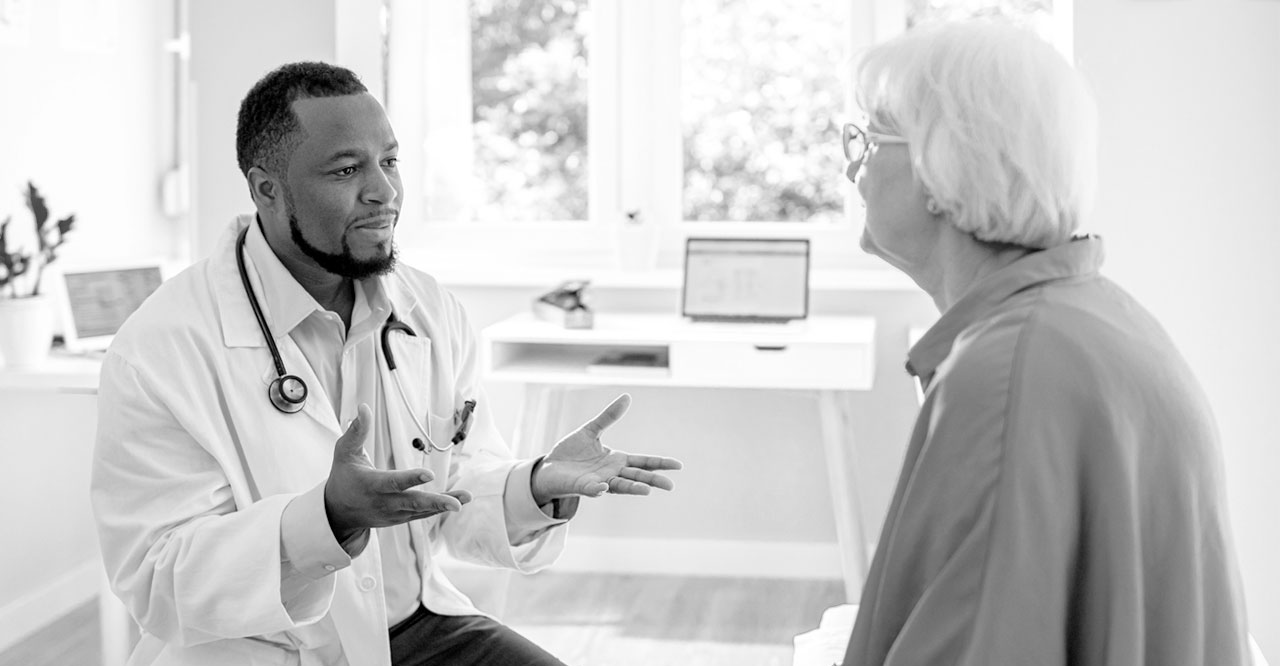 Doctor speaking with medicare patient