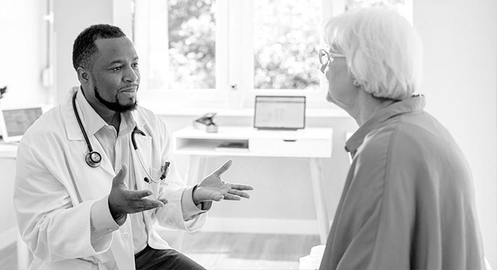 Doctor speaking with medicare patient