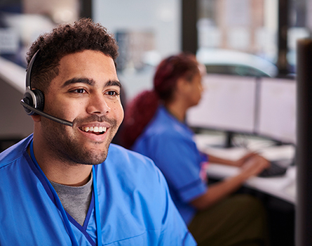 A man wearing a headset looks ready to take a call.
