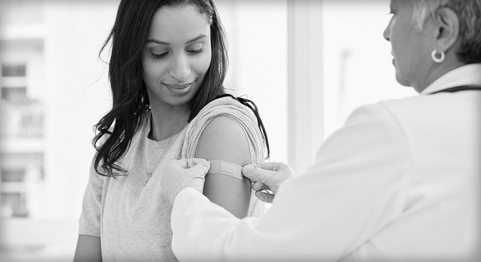 Woman getting vaccinated