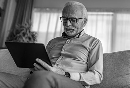 Man looking at a laptop