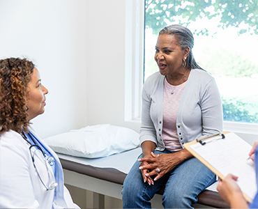 A patient talks to a doctor.