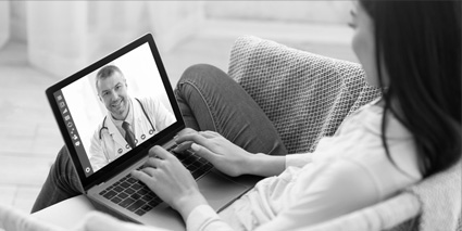 Woman doing an online doctor's appointment.