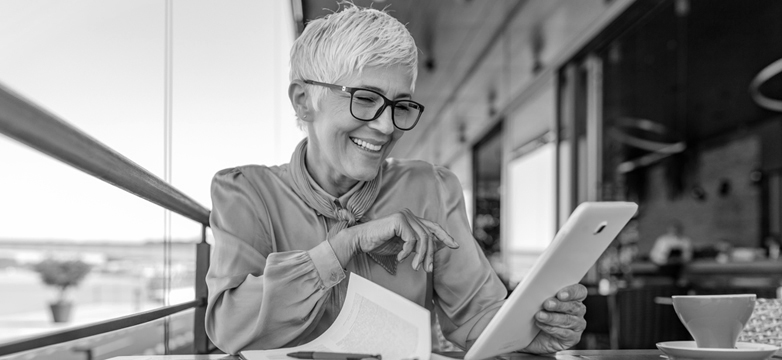 Woman smiles while logging in.