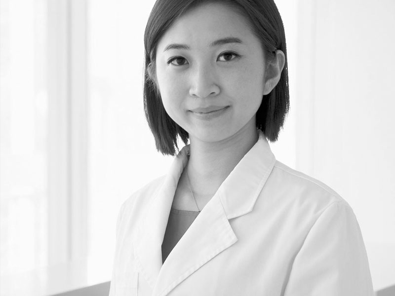 Close up of a young, female doctor.