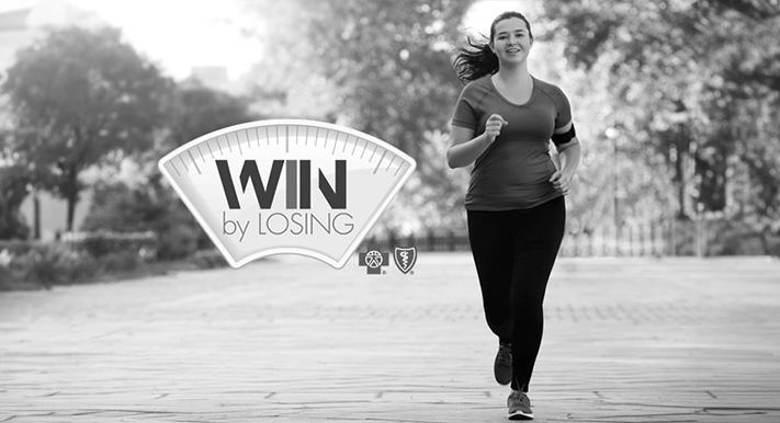 A woman happily goes jogging