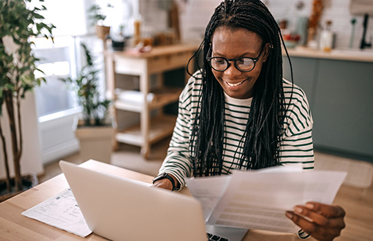 A small business owner works out of her home office.