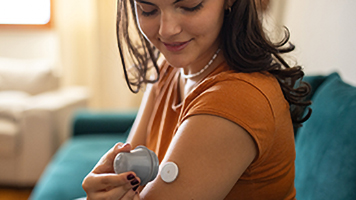 A woman checking her insulin levels