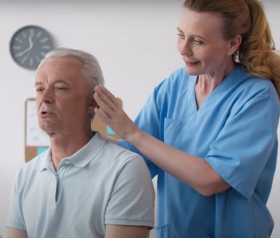 A patient talks with their doctor