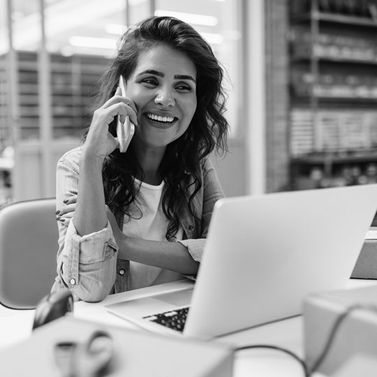 picture of person on phone smiling