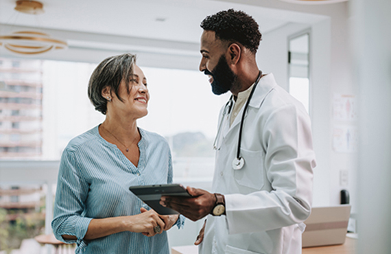 A doctor talks to his patient.