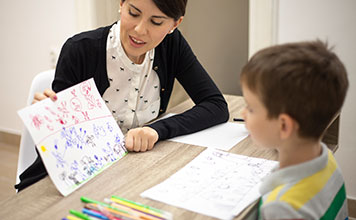 A teacher giving a lesson to a single student